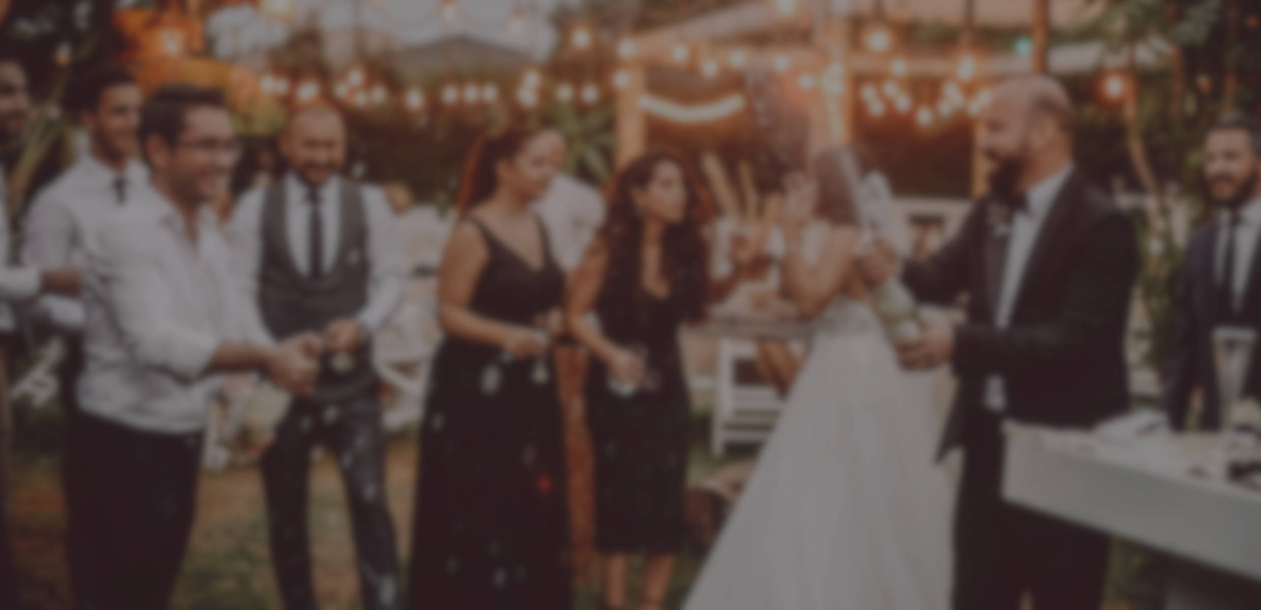 A group of people celebrating at an event, representing the events that can be planned on Our-Venue.com